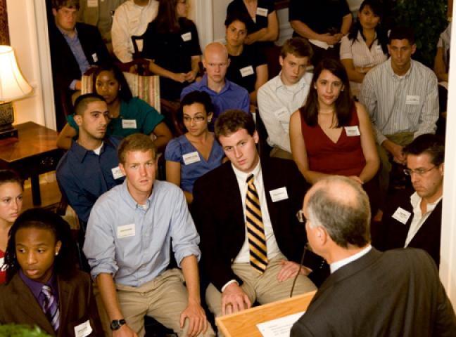 President Casteen speaks to students seated in the Carr’s Hill entrance hall