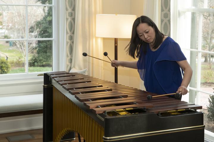 I-Jen Fang, an associate professor in the McIntire Department of Music, plays the marimba, a percussion instrument during the inaugural Arts on the Hill event hosted by President Ryan at Carr's Hill.